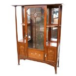 An Art Nouveau mahogany display cabinet, with inlaid metal and fruitwood decoration, stepped and