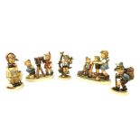 A group of five large Hummel china figurines, comprising Scooter Tim, Camera Ready (1977-2002) 25