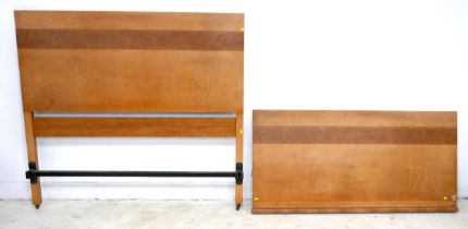 An Art Deco double bed headboard, 137 by 126cm, and footboard, 137 by 58cm, maple and burr walnut