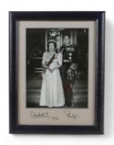 A signed photograph of Queen Elizabeth II and The Duke of Edinburgh, 1992, presented to a Foreign