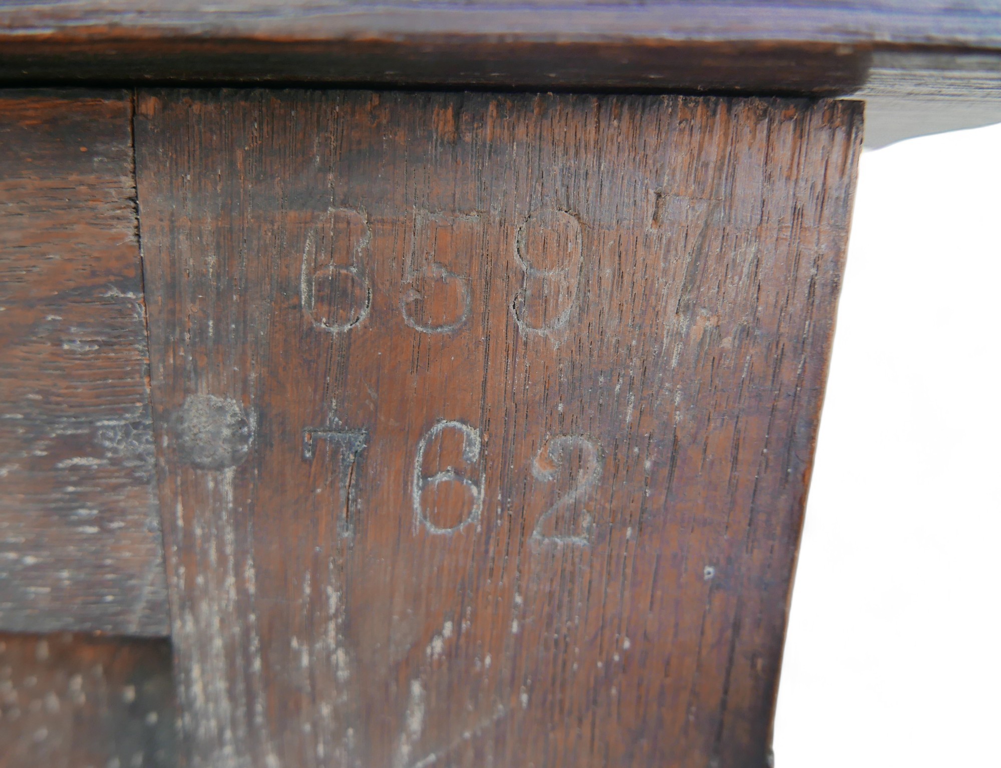 A mid 20th century stained oak chest, labelled 'Inglesants, Furnishers of Leicester', carved arch - Image 9 of 9