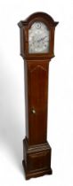 A 1930s mahogany chiming granddaughter clock with Westminster, Winchester and Whittington chimes,