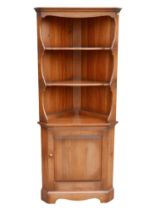 A vintage Ercol corner cupboard, 'Corner Cupboard', model 474, in polished Old Colonial colour, 54