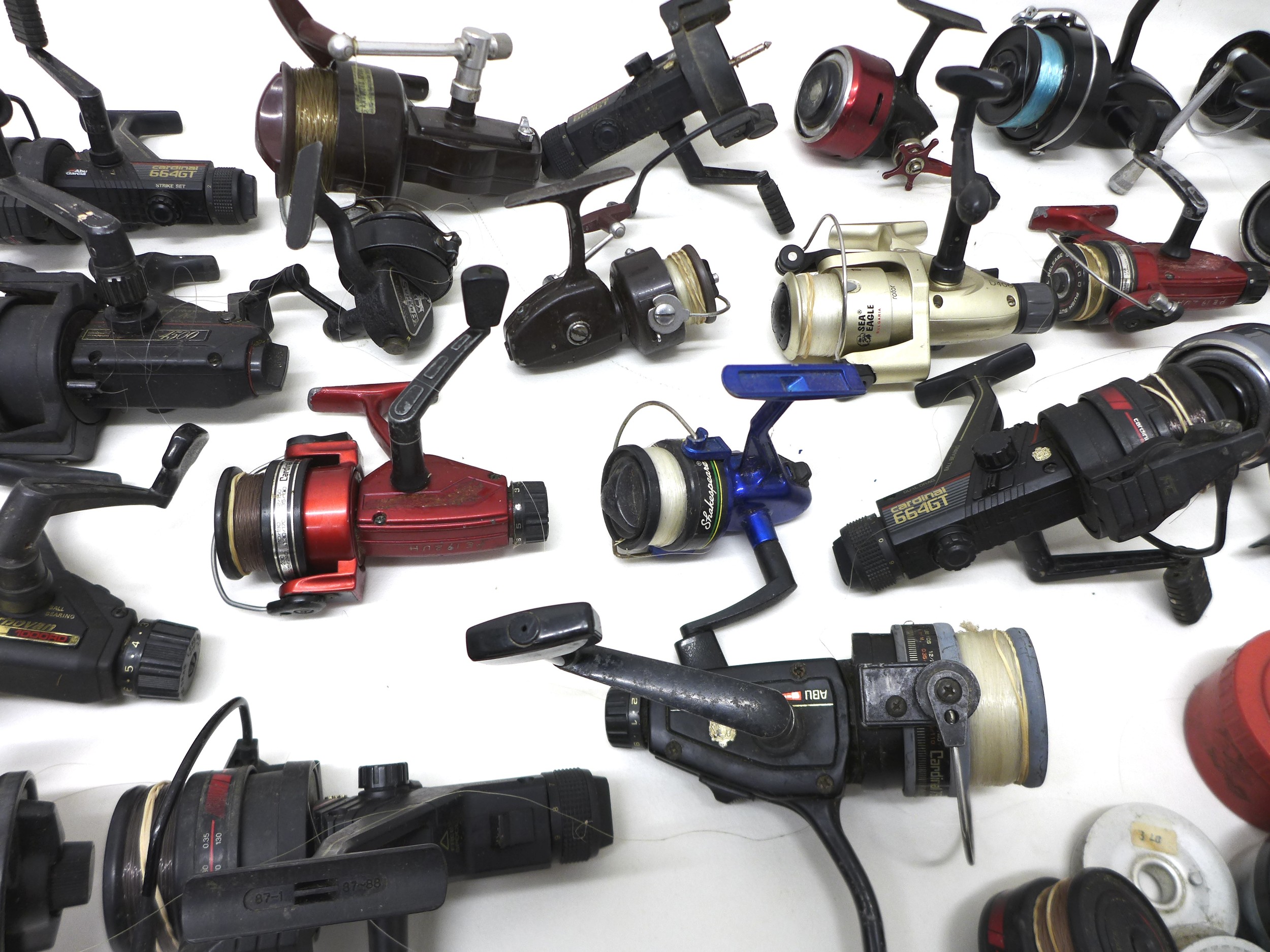 A collection of thirty three spool fishing reels including Shimano Triton Baitrunner, Cardinal - Image 2 of 6