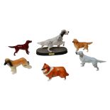 Six Beswick figurines of dogs, including 'The Setter' raised upon a plinth, 22.5cm high. (6)