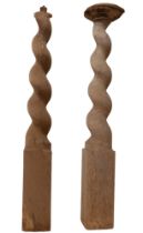 A pair of 17th century oak barley twist columns, 13 by 13 by 107cm high. (2)