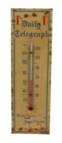 A Daily Telegraph "Real news-sane views" Shop thermometer, 10.5cm by 33.5cm. Some foxing but