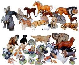 A large collection of assorted animal figurines, including horses, elephants and tigers. (qty)