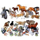 A large collection of assorted animal figurines, including horses, elephants and tigers. (qty)