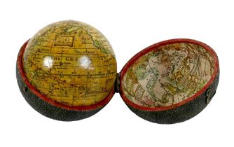 A George III pocket globe and shagreen case, 2 ¾" diameter, likely George Adams after Herman Moll,