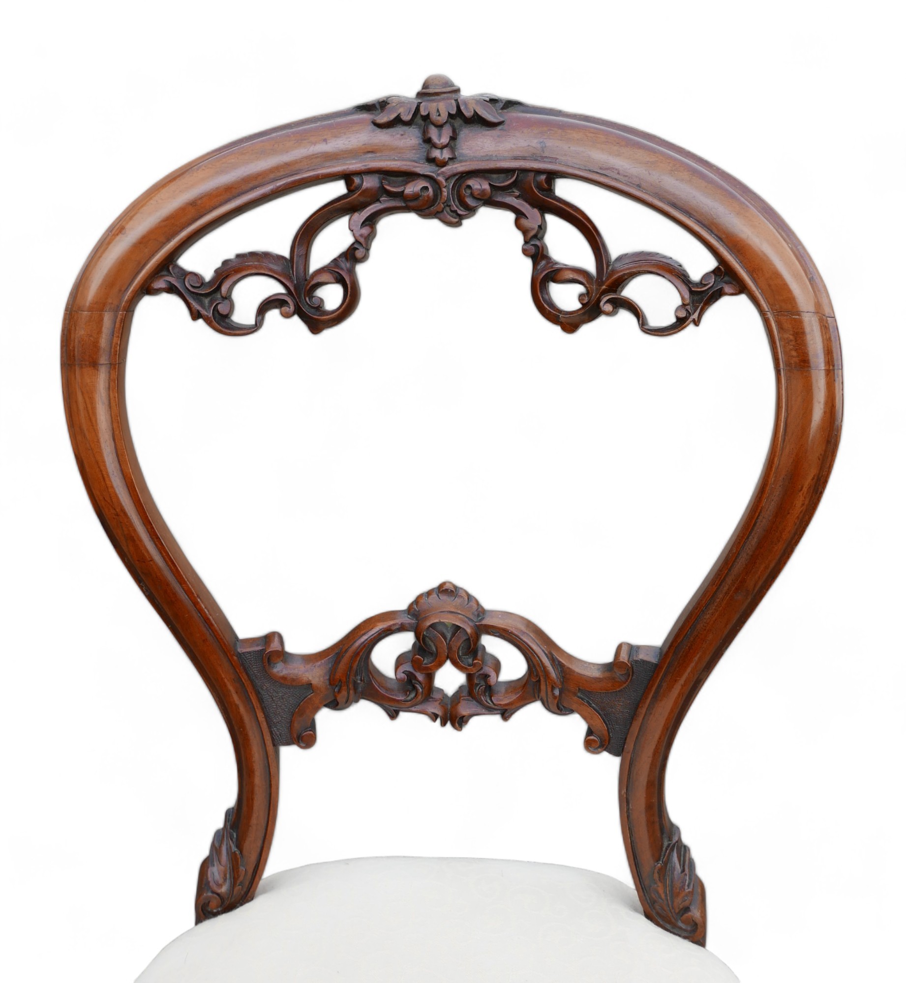 A set of six Victorian dining chairs, the balloon back and middle rail carved with foliage - Image 5 of 12