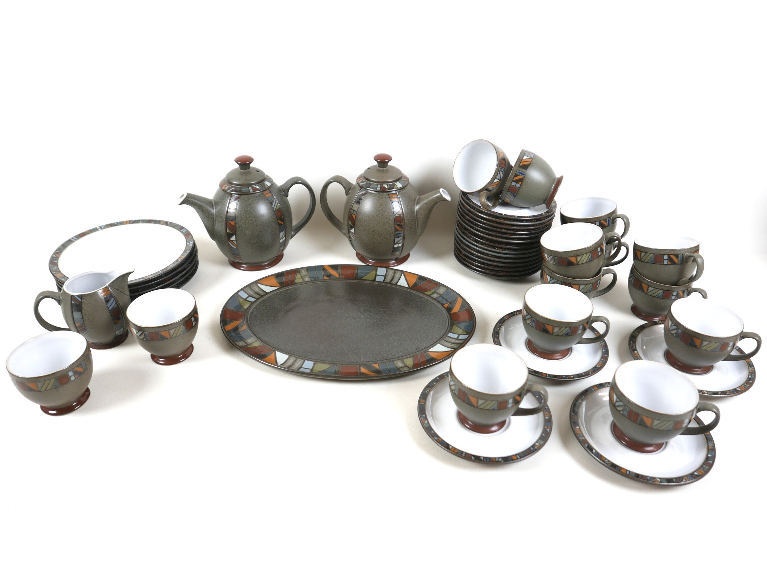 A Denby Marrakesh coffee/tea service forty two pieces. Some utensil marks but generally good.