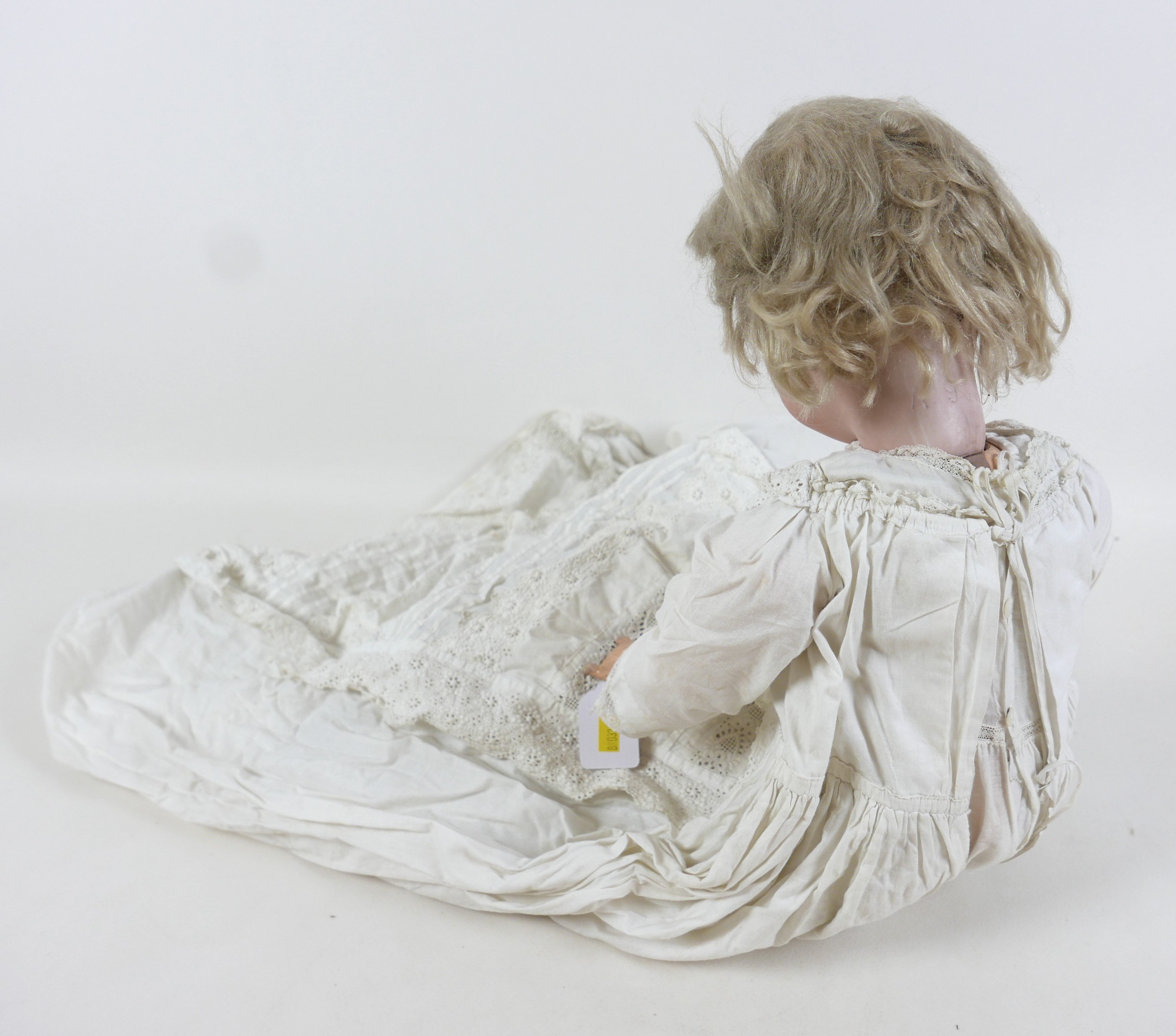 An Armand Marseille bisque porcelain headed doll with open mouth and sleepy eyes, 80cm tall. Some - Bild 8 aus 14