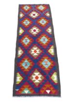 Brown edged multicoloured geometric hand knotted woollen runner rug, 192 by 66cm.