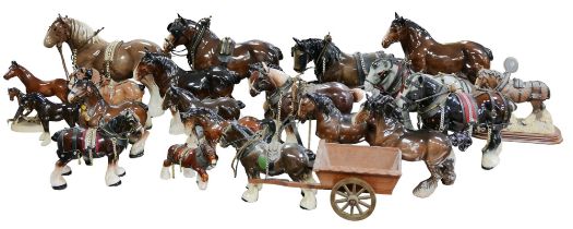 Over twenty ceramic equine figurines, mostly shire horses, including some by Melba