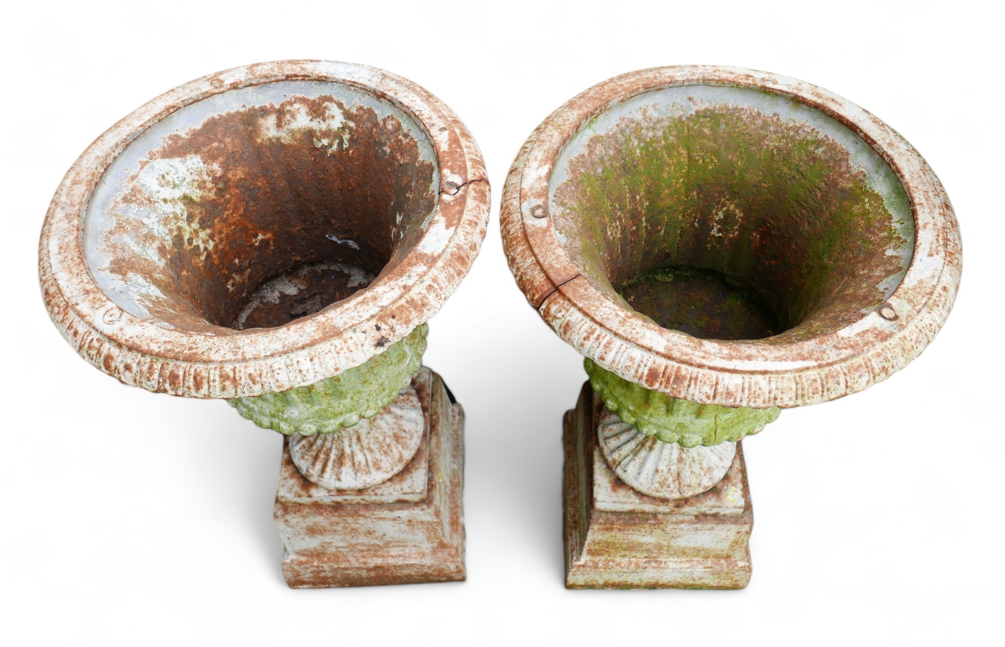 A pair of cast iron fluted garden urns on pedestals with square bases. (2) - Image 4 of 5