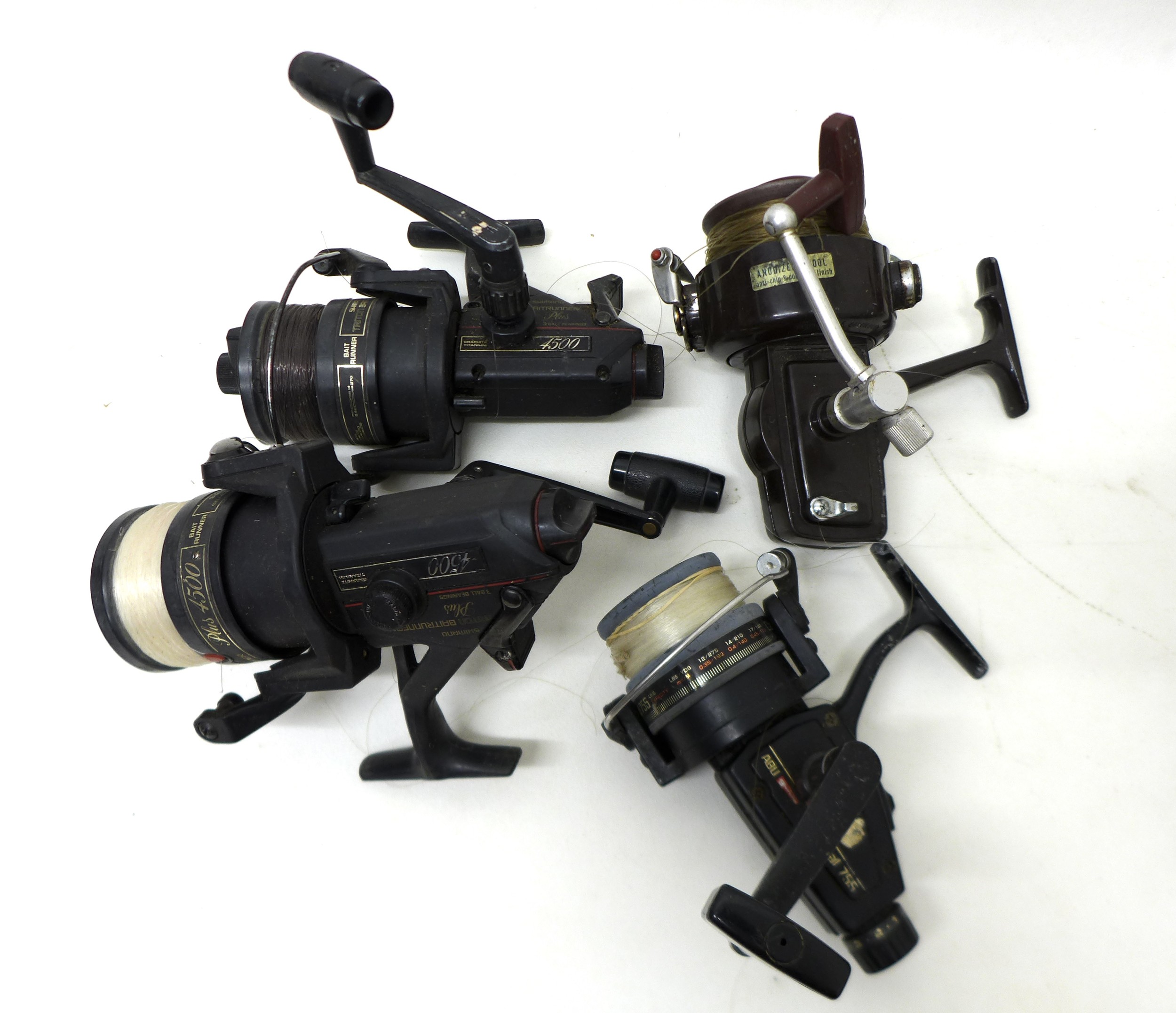 A collection of thirty three spool fishing reels including Shimano Triton Baitrunner, Cardinal - Image 4 of 6