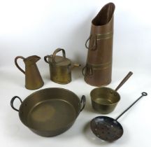 A small collection of copper and brass wares, including a copper coal scuttle, 56.5cm high, a