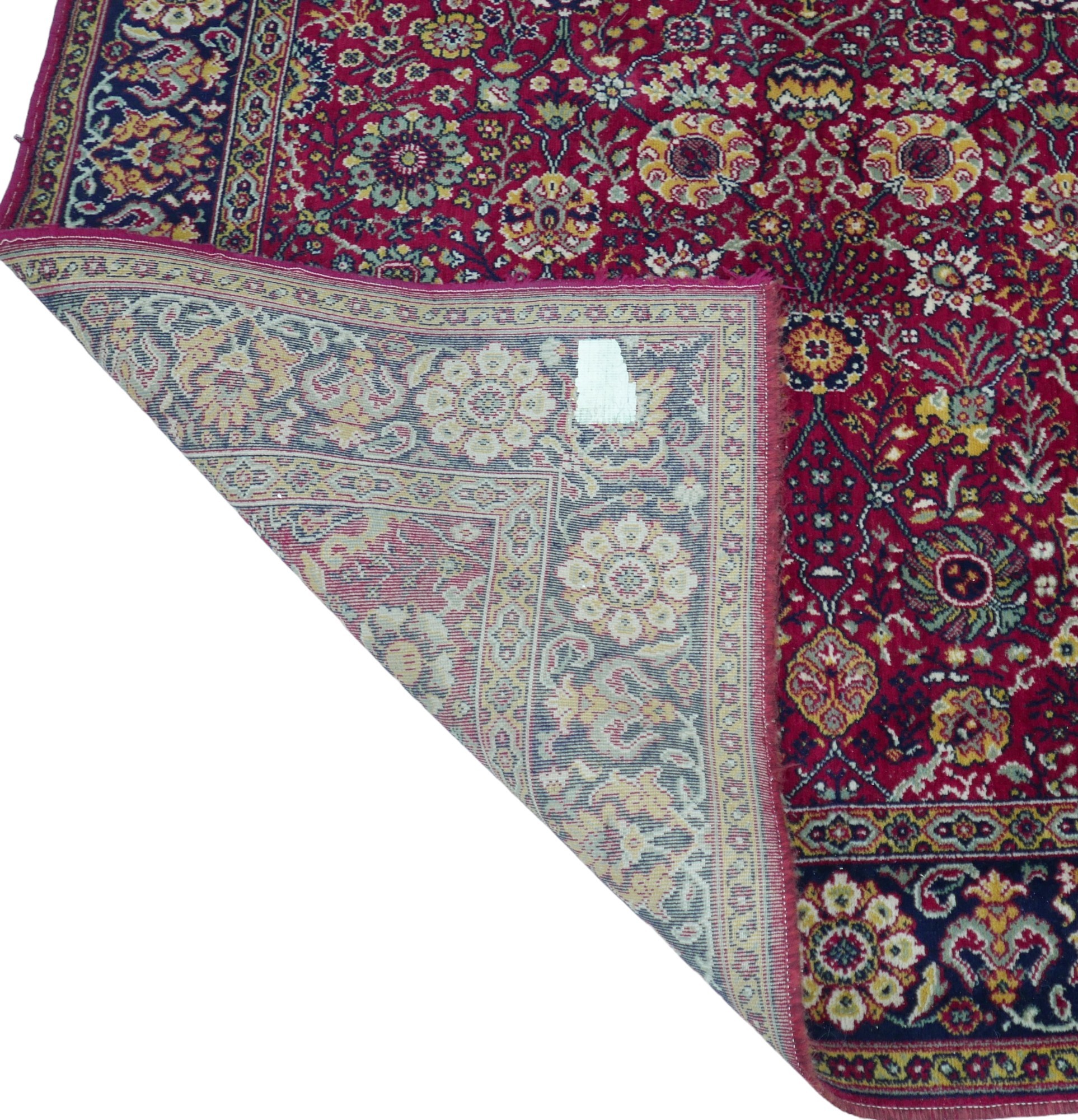 A Hamadan rug, red ground with repeating pattern to central panel, two narrow borders flanking a - Image 2 of 3