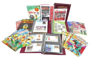 A collection of sporting stamp albums and ephemera, including three albums of first day covers, a