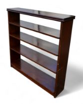 A mahogany free standing bookcase, open back, with four shelves.