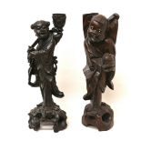 Two Chinese carved wooden figures, one previously a table lamp base, both 37cm high. (2)