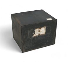 A black painted strong box, missing its key, 46 by 55 by 43cm high.