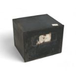 A black painted strong box, missing its key, 46 by 55 by 43cm high.