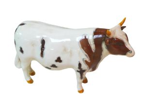 A Beswick Ayreshire Bull figurine, 'Ch. Whitehill Mandate' to its base.