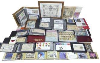 A large and extensive collection of stamps, first day covers, cheques, and share certificates in