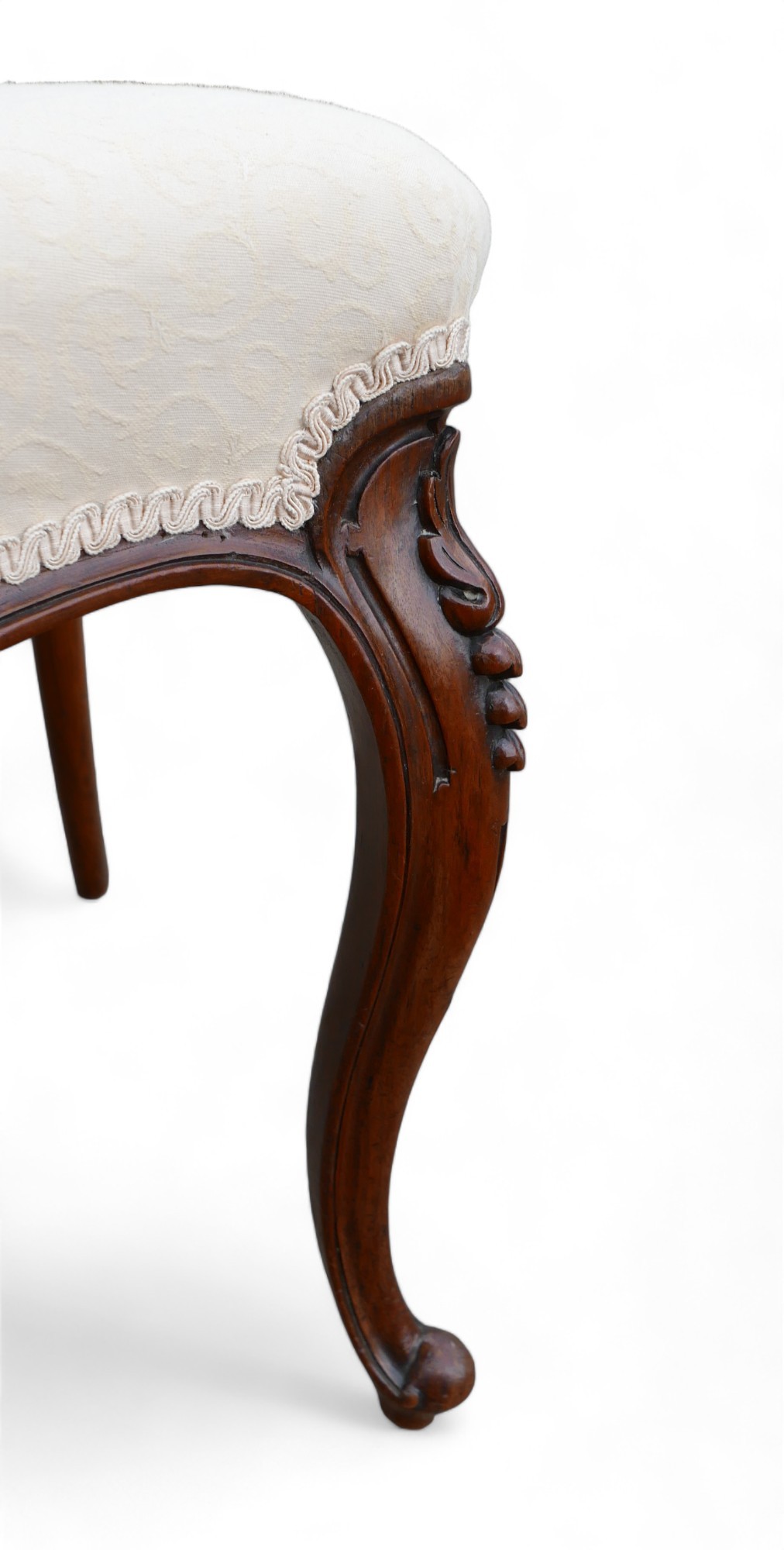 A set of six Victorian dining chairs, the balloon back and middle rail carved with foliage - Image 6 of 12