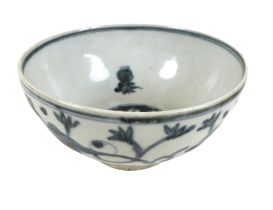 A Chinese porcelain bowl, late Ming period, decorated in underglaze blue internally with four
