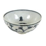 A Chinese porcelain bowl, late Ming period, decorated in underglaze blue internally with four