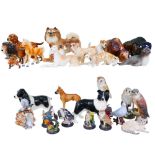 Over 25 ceramic figurines of animals, including dogs and birds. (qty)