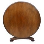 A mahogany coffee table, circular tilt top, cut down from a centre table, platform base, 104 by