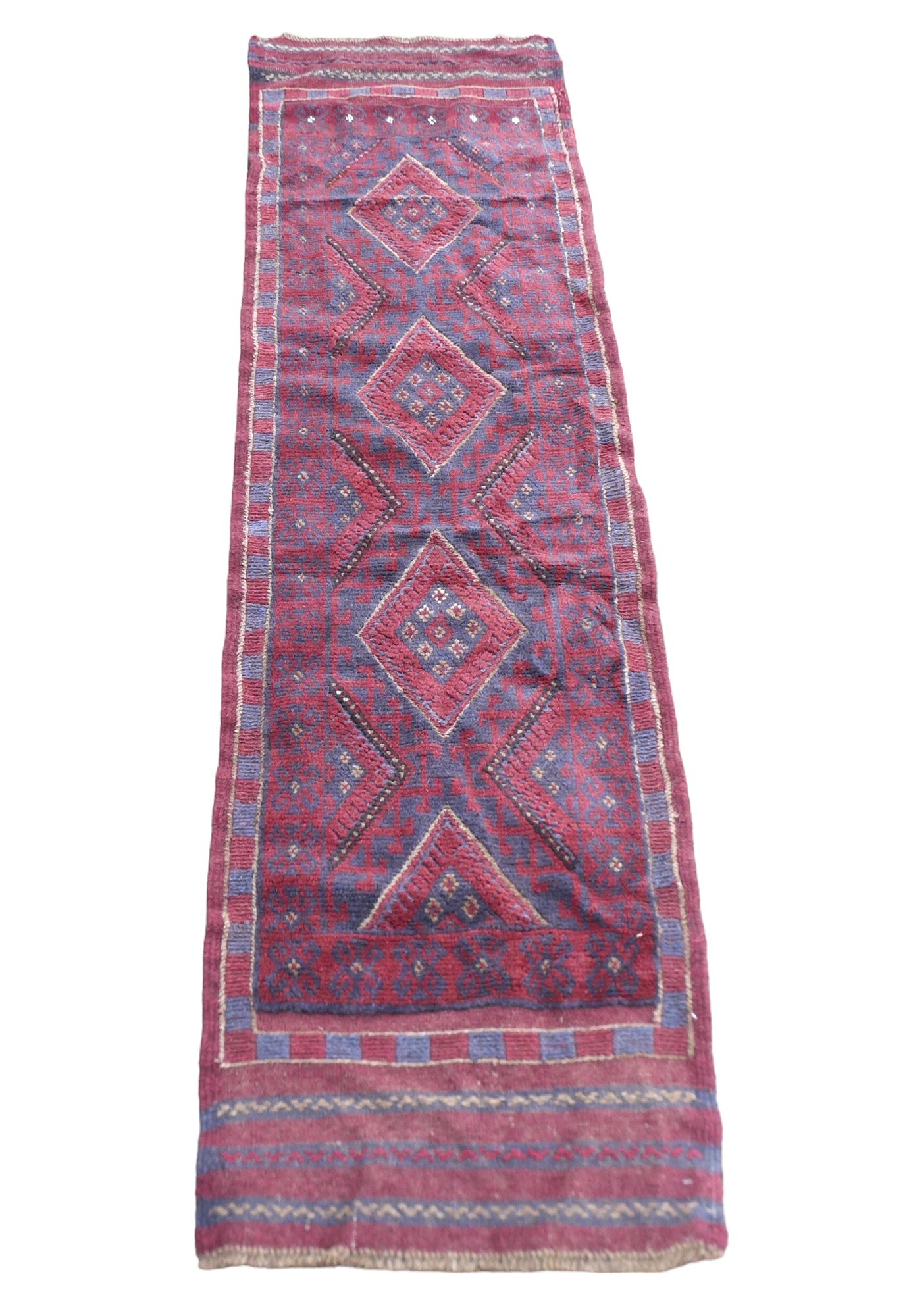 Red and blue geometric 100% hand knotted woollen runner rug, 240 by 60cm.