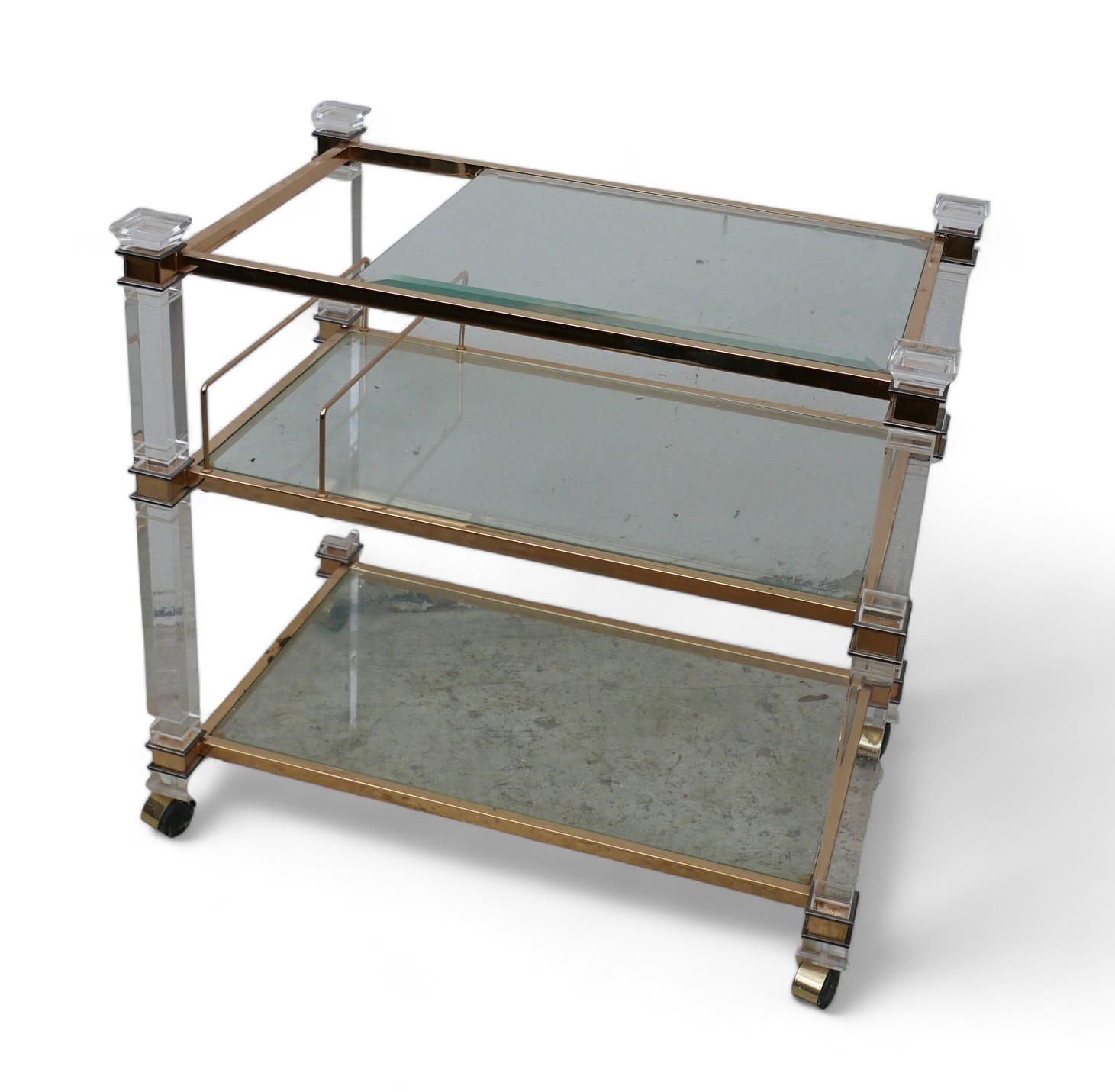 A clear glass and brass /gilt drinks trolley, three tier, rectangular, Italian.