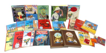 A collection of twenty three Tintin annuals and books including Herge Chronologie Dune Oeuvre.