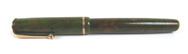 A Parker Moderne fountain pen, green and brown marble effect with gilt metal mounts, nib marked '