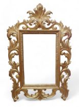 A modern decorative gold coloured mirror.