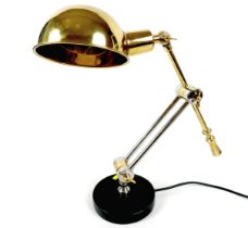 A modern brass angle poise office lamp, approximately 50cm high.