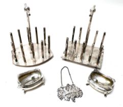 A collection of silver and silver plate items, including two silver plated toast racks, two