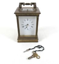 A good quality brass carriage clock with repeat by Matthew Norman London, striking on a gong 10cm by