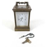 A good quality brass carriage clock with repeat by Matthew Norman London, striking on a gong 10cm by
