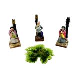 A group of four pieces of Bretby pottery, comprising two Sairey Gamp Dickens character lamp bases,