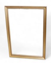 A gilt framed wall mirror, 71cm by 4cm by 100cm.