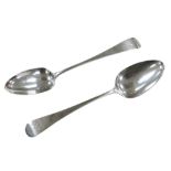 A pair of George III old English pattern silver table spoons, both with a 'B' monogram to each