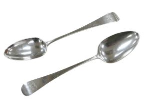 A pair of George III old English pattern silver table spoons, both with a 'B' monogram to each