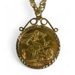 A George V gold sovereign, 1911, in 9ct gold mount, on a 9ct gold chain, total weight 18.7g.