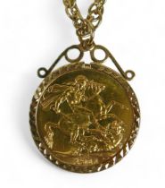 A George V gold sovereign, 1911, in 9ct gold mount, on a 9ct gold chain, total weight 18.7g.